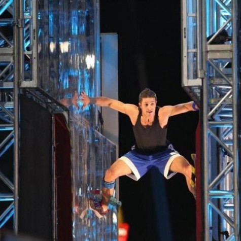 Andrew Lowes climbing the obstacle the Jumping Spider on NBC's hit TV show "American Ninja Warrior."