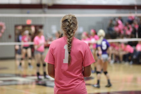 Senior Marissa Grant gets ready to serve at the annual Volley for a Cure game on Tuesday, Sept. 30.