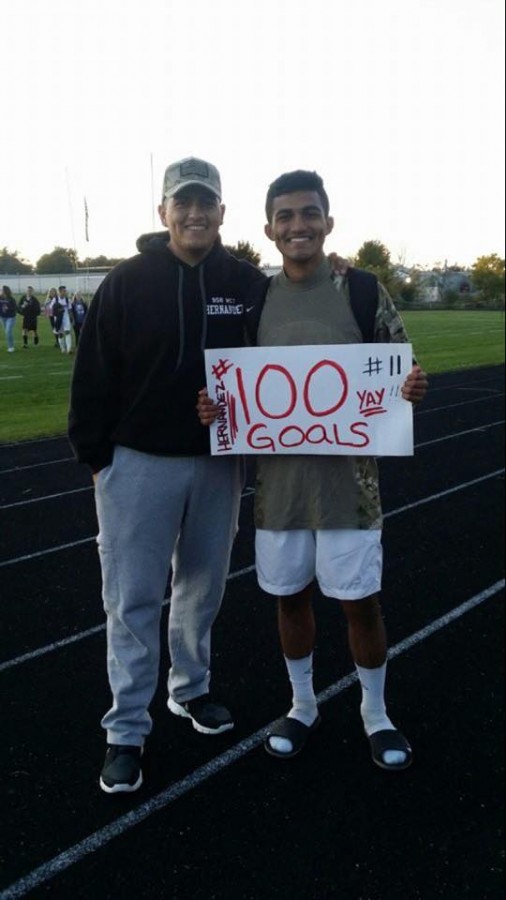 ACHS senior Iven Hernandez with his brother, Andy, after scoring his 100th goal for the boys Varsity soccer team on Oct. 9 against Zion-Benton.