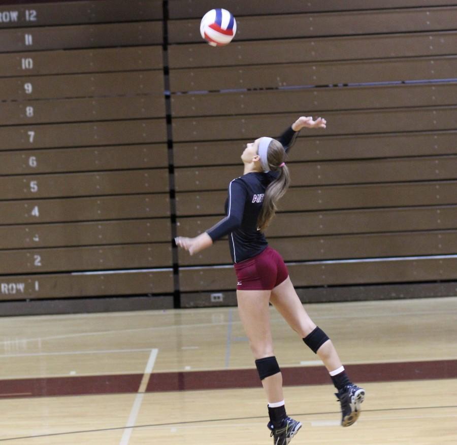 Amanda Spera sets up for a serve.