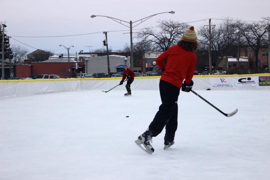 Incoming Freshman, Will Beake plays hockey on the ice rink in downtown Antioch.
