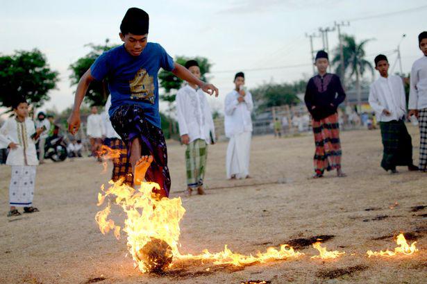 Indonesian students playing Sepak Bola Api.