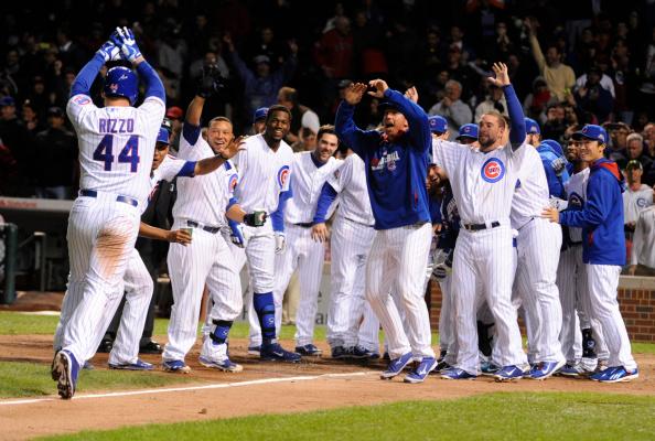 CHICAGO, IL - SEPTEMBER 15:  Anthony Rizzo #44 of the Chicago Cubs celebrates his walk-off home run in the ninth inning against the Cincinnati Reds on September 15, 2014 at Wrigley Field in Chicago, Illinois. The Chicago Cubs defeated the Cincinnati Reds 1-0. (Photo by David Banks/Getty Images)
