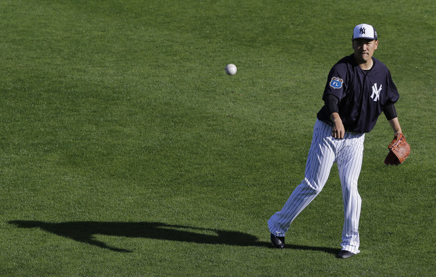 New York Yankees Masahiro Tanaka, of Japan, during a spring training baseball workout Monday, Feb. 22, 2016, in Tampa, Fla. (AP Photo/Chris OMeara)