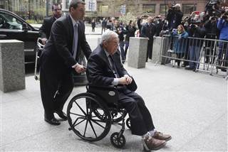 Dennis Hastert in wheelchair arriving in Chicago for sentencing.