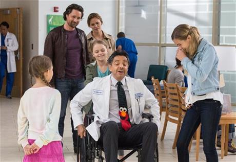 Anna Beam pushes her doctor in a scene from  Miracles From Heaven 