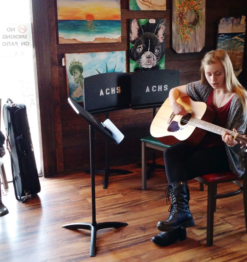 Tri-M+Performs+At+The+Latte+Cafe