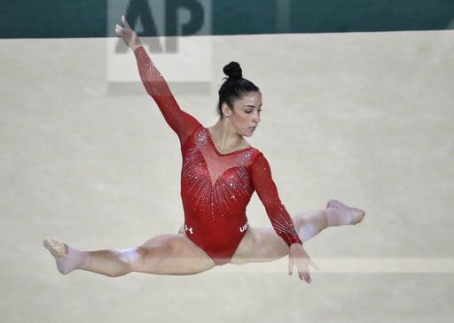 Aly Raisman chose a simpler route for the Individual Finals. Raisman wore a red v-neck leotard with diamonds in an intricate design. She kept all eyes on her uniform by wearing her hair up in a simple bun, complimenting her uniform well.
