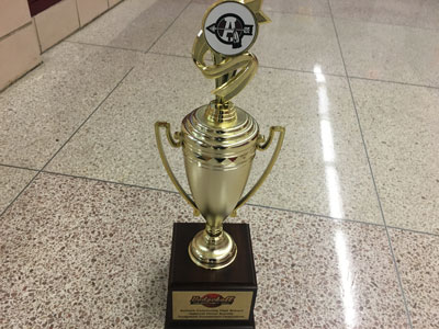 The trophy, won by the Wacky Waving Inflatable Arm-Flailing Tubemen, is being proudly displayed in the glass case of room 169 in the science hallway.