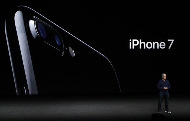 Apple CEO Tim Cook announces the iPhone 7 on Wednesday.