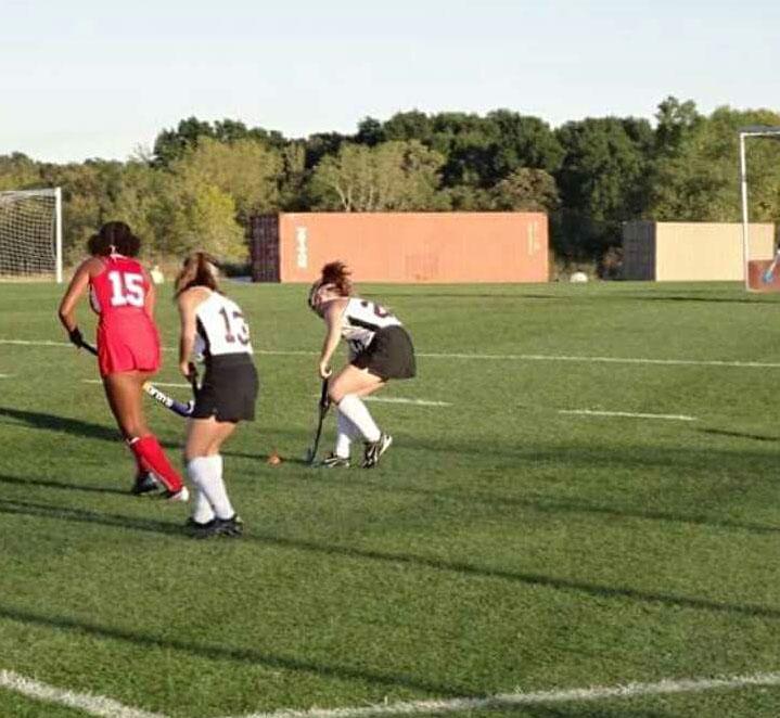 Beckman looks to pass the ball to a teammate