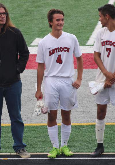 Senior Zachary Tholen laughs during Senior Night for boys soccer during their game against Grant on October 6th.