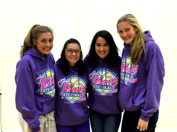 The state qualifying tennis girls pose in their  matching sweatshirt for a photo.