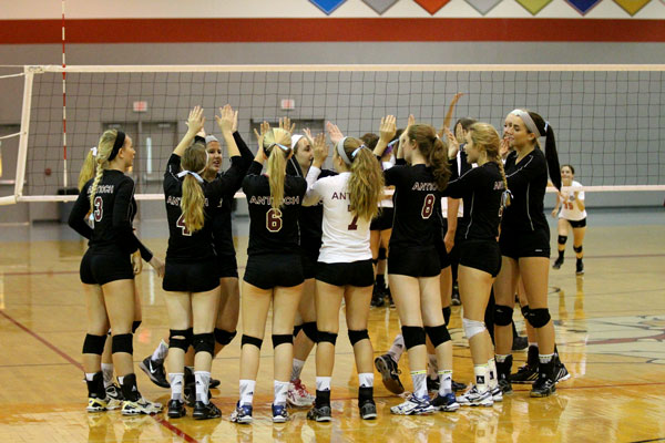 Sequoit volleyball girls celebrate their win as their season comes to an end.