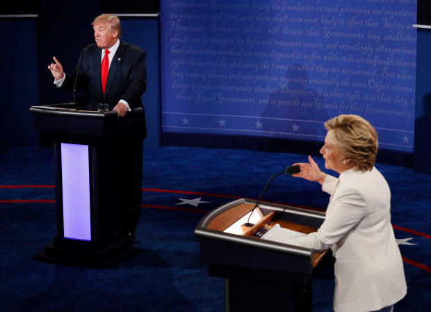 Democratic presidential nominee Hillary Clinton and Republican presidential nominee Donald Trump debate during the third presidential debate at UNLV in Las Vegas, Wednesday, October 19, 2016. 