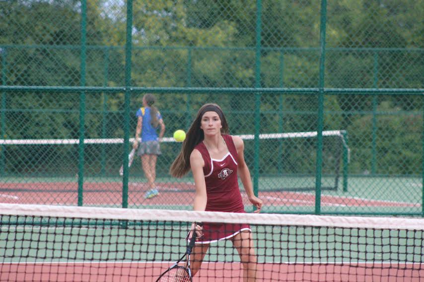Freshman Jenny Horner returns a serve during one of her many tennis matches. 