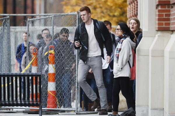 Students leave buildings after police respond to an attack on Ohio State University Campus.