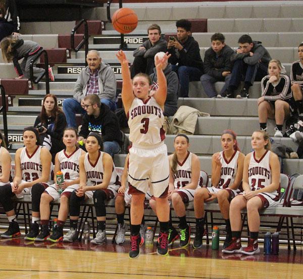 Taylor Feltner shoots a three against Zion-Benton earlier this season.