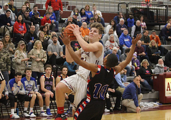 Daniel Filippone goes up for a layup against Lakes earlier this season.