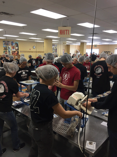 ACHS National Honor Society members volunteered their to make meals for the malnourished around the world on Thursday,  February 16.