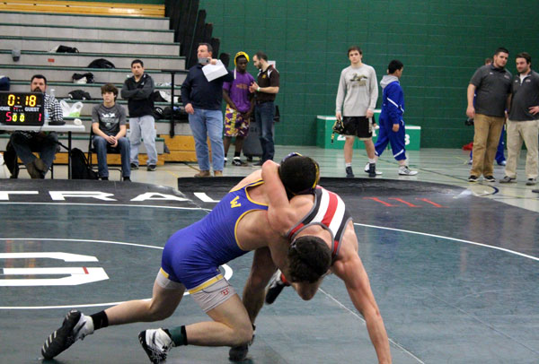 Nicolas Garcia goes up against rival team Wauconda in the regionals meet, which he lost 9-5.