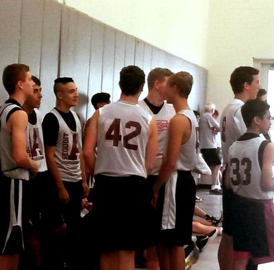 Robert Christainsen (far left) stands with teammates before practice. 
