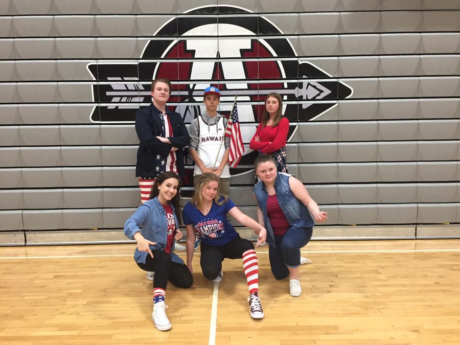 Seniors (from top left to bottom right) Kyle Whitely, Booker Grass, Emily Holmes, Kristina Esdale, Megan Helgesen and Chloe Moritz all wear red, white and blue for letter A: America Day.