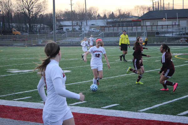 Ella Roberts battles Zion attacker for posseion for the ball. Sequiots win the match with a 3-0 vitory over the Zion Bees. “ Ella is a fast, agressive and highly talented player that brings strength to our team” junior and teammate Danielle Brose said.