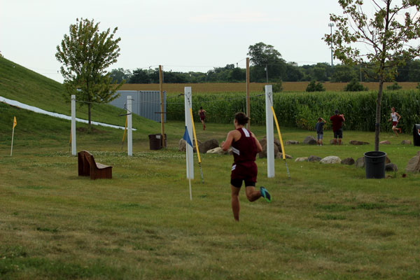 Sequoit runner Charlie Smith adds to his lead Tuesday against the Richmond Burton Comets.