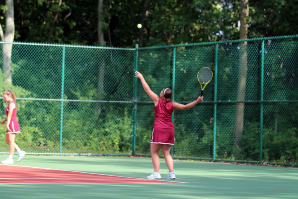 Antioch girls serving to the Rams during their match.