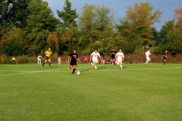 Junior Micheal Espitia gets the ball and forces it up to the forwards to continue the attack. 