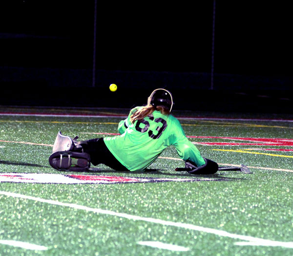 Junior Zöe Semersky blocking a ball from a game earlier this season.