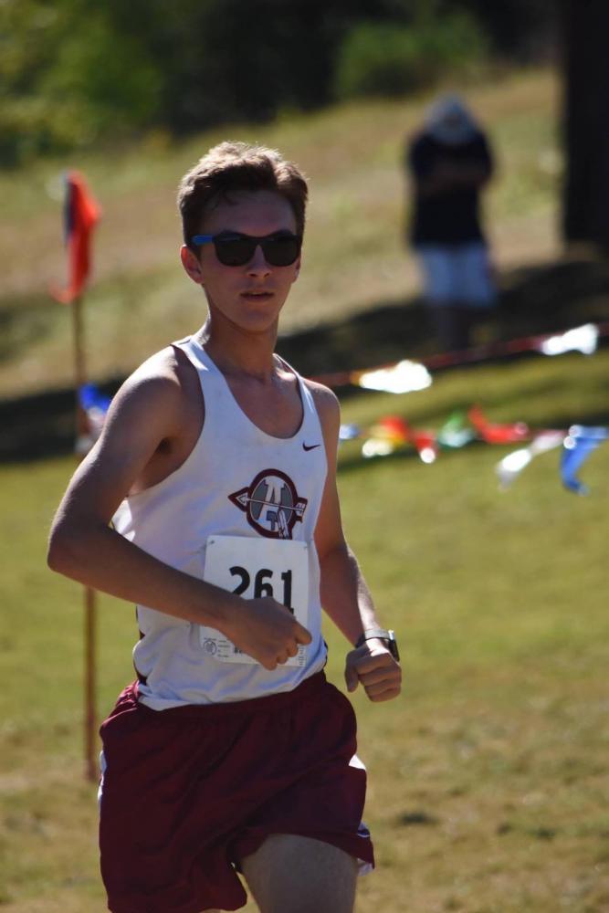 Junior Cale Wolf pushes himself to beat his personal record. 