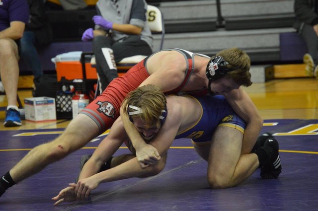 Junior Mikey Volkmar takes on a Wauconda wrestler December 1 in their dual meet. 