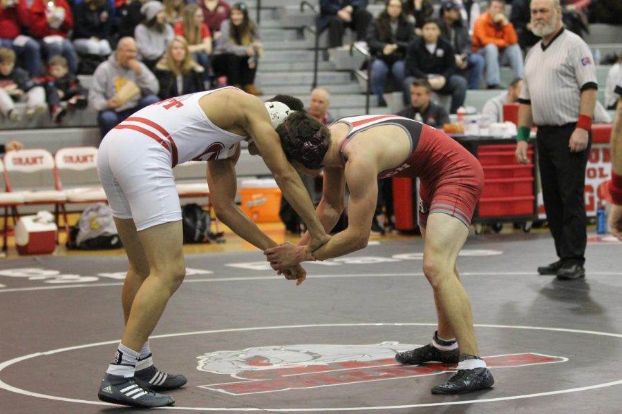 Nico Fier begins his match at 170 against Grant.