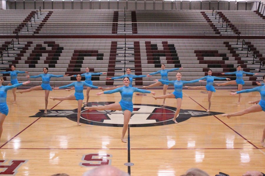 The varsity dance team performs at the NLCC conference championship