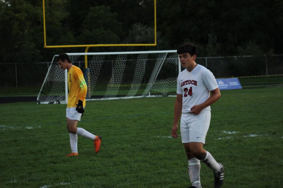 Eli Ruano walks off the field after a tough defeat.