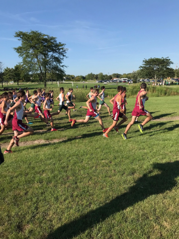 Boys cross country starts their race off strongly.