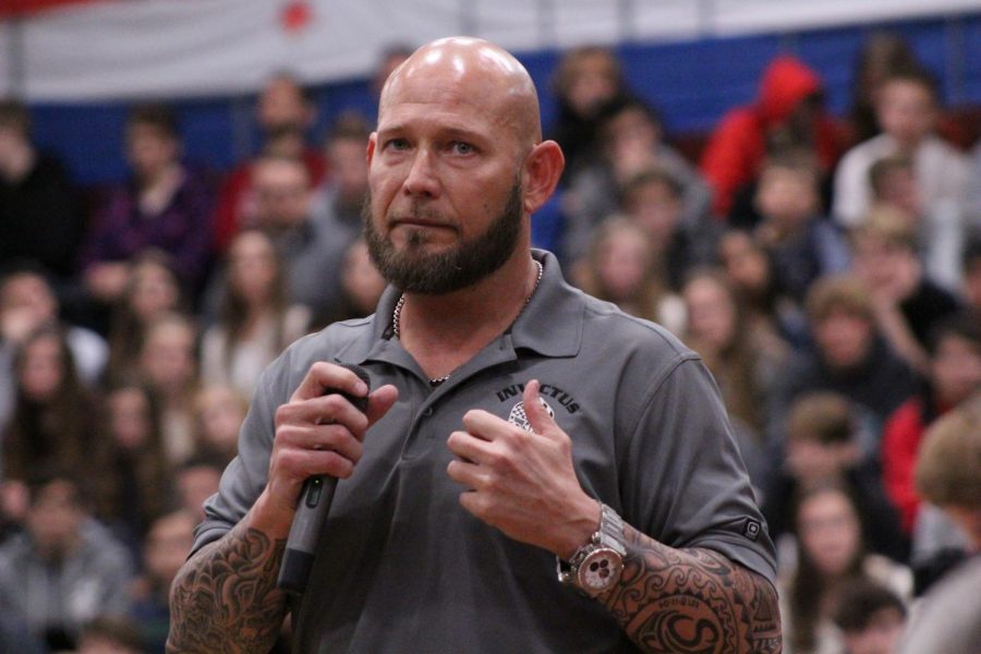 Navy Master Chief Kevin Brylski gives the keynote speech at the District 117 Veterans Day assembly. 