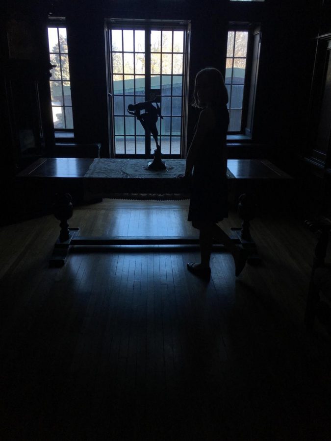 Senior Alanna Lowry stares out at wistfully at the sunshine outside of Casa Loma, located in Toronto, Canada.