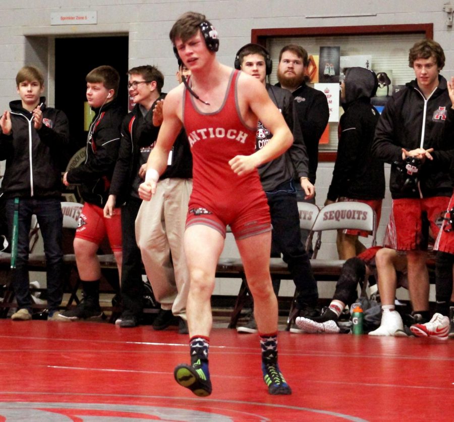 Robert Miseak struts his stuff after taking down his opponent. 