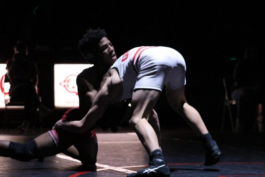 Jackie Sistrunk sprawls on his competitor to bring him to the mat.