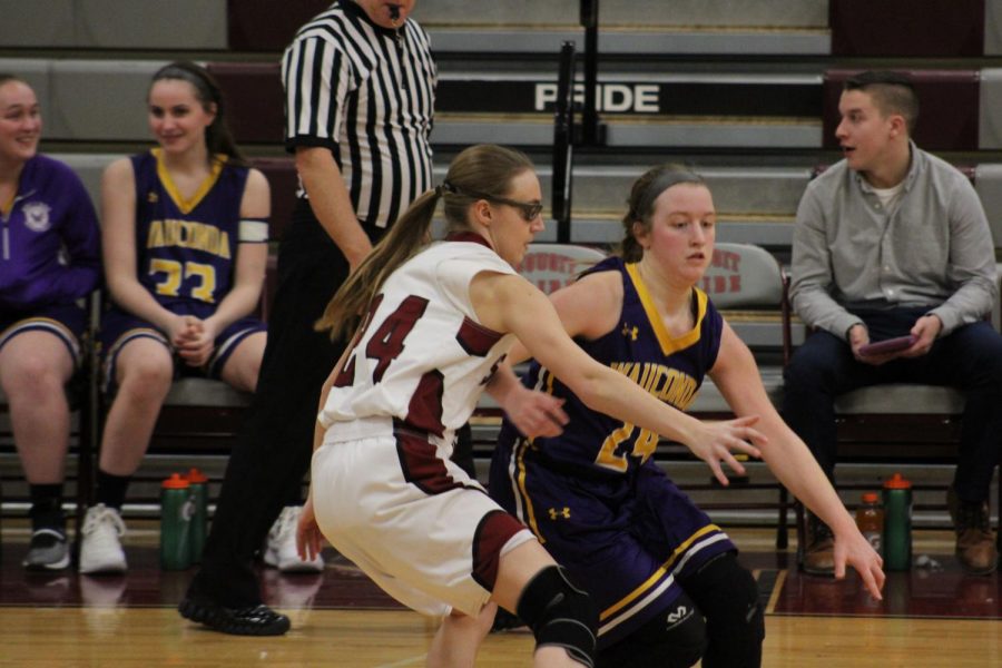 Senior Samantha Brown guards her opponent.