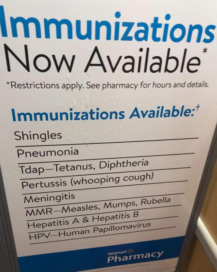 The Walmart pharmacy displays types of vaccines a person can get for different illnesses.
