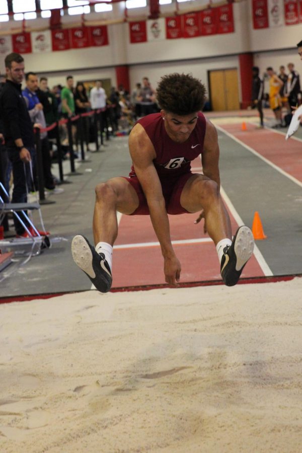 Junior Tre Watson looks to reach a person record in the long jump. 