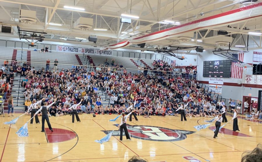 The Color Guard performed at the first pep rally of the year for ACHS. The theme was 1930s Chicago. The team used many props, such as sabres and fake guns.