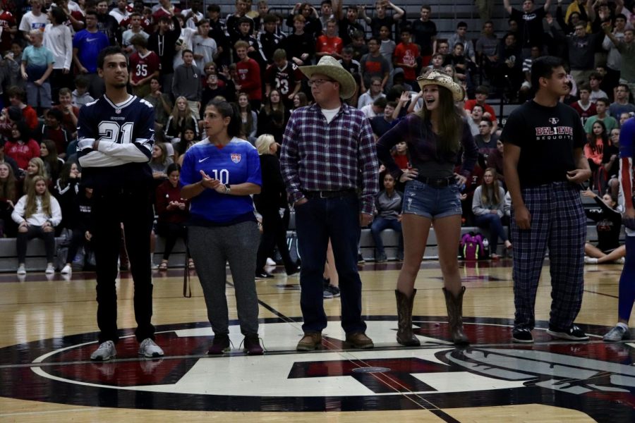 Two of the ACHS teachers dressing up for the themes of the football games and making the back to school assembly more energetic.