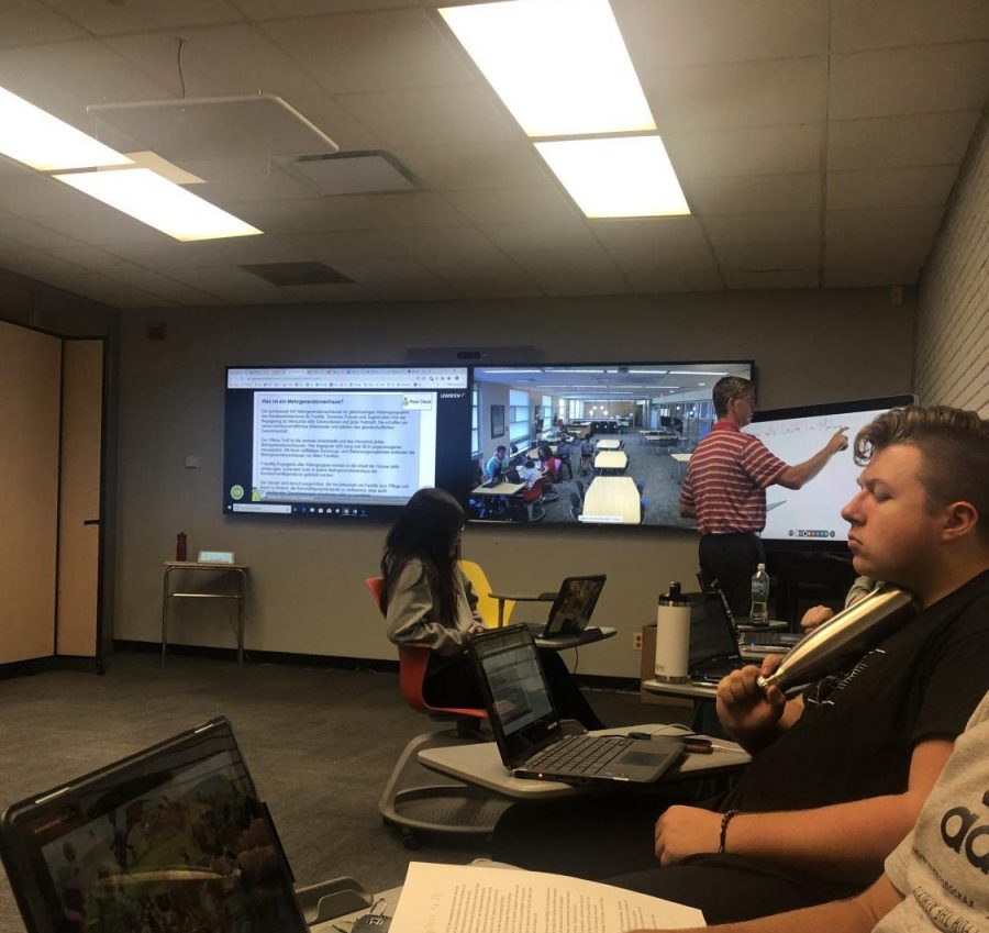 The AP German class consists of Antioch students in person and Lakes students over video chat. This photo shows the two screens being shown to both schools: one with the learning material and another with a live broadcast of the other schools classroom. This way, the students are taking in the same information while still being able to see who they are learning with.