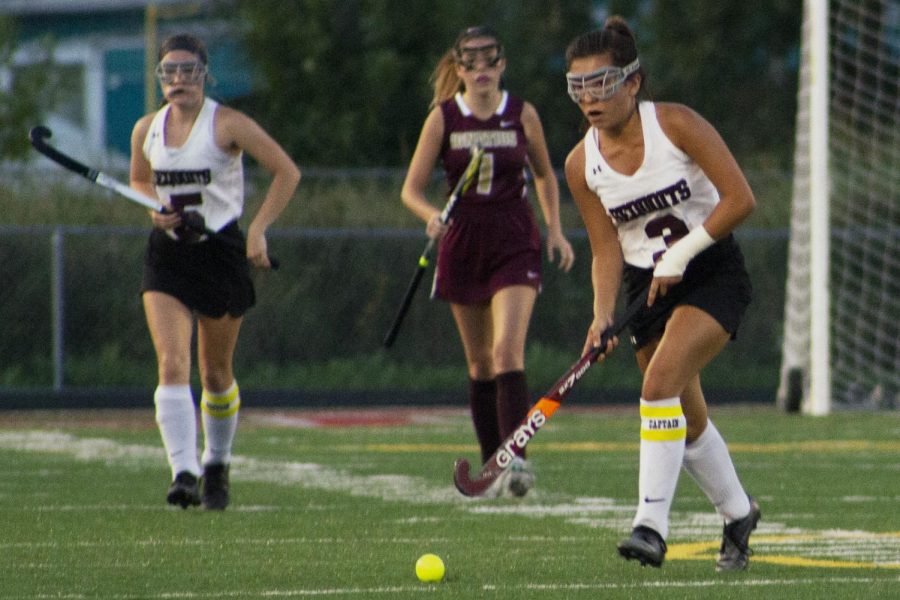 Senior Sarah Smith moves the ball down the field.