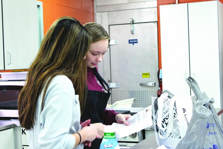 The Model UN were making food for a bake sale to raise money for the club and to get support from the community.